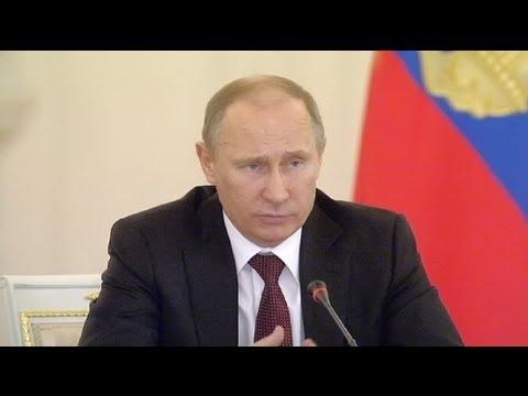 Moment image for Vladimir Putin signs law prohibiting US adoption of Russian children