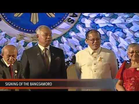 Moment image for Comprehensive Agreement on the Bangsamoro (CAB) signing between Philippine government and MILF