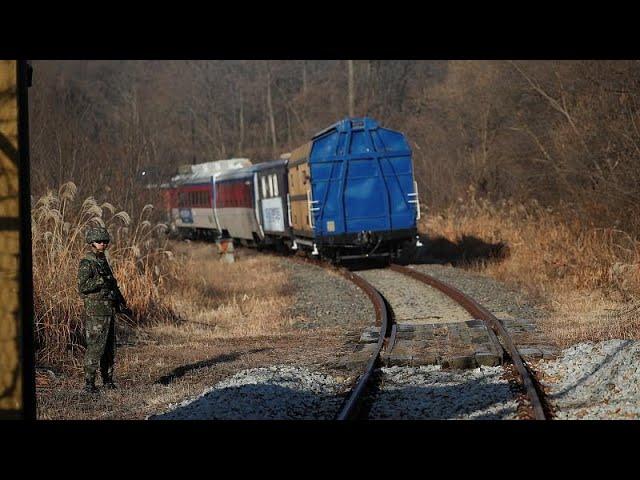 Moment image for Historic Reconnection: Trains Cross Border After 56 Years