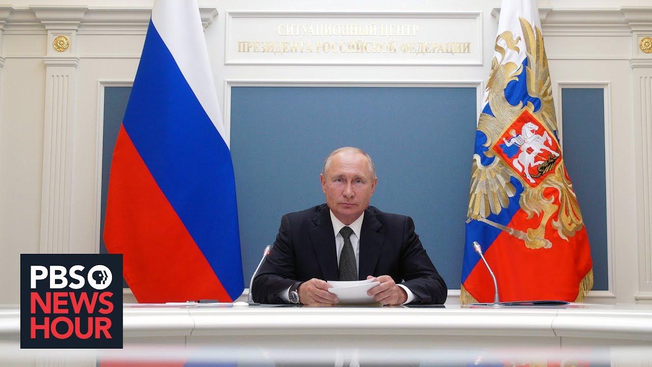 Moment image for Passed constitutional amendments allowing him to potentially stay in power until 2036