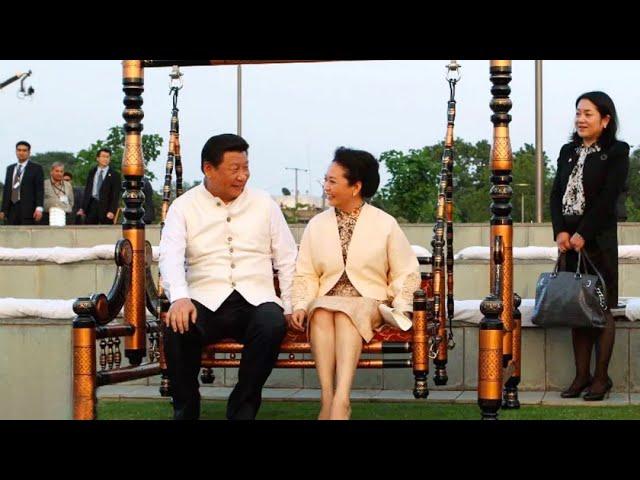 Moment image for Peng Liyuan: Chinese Folk Singer's Marriage