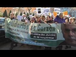 Garzón faces criminal charges in three cases, sparking international scandal and protests.