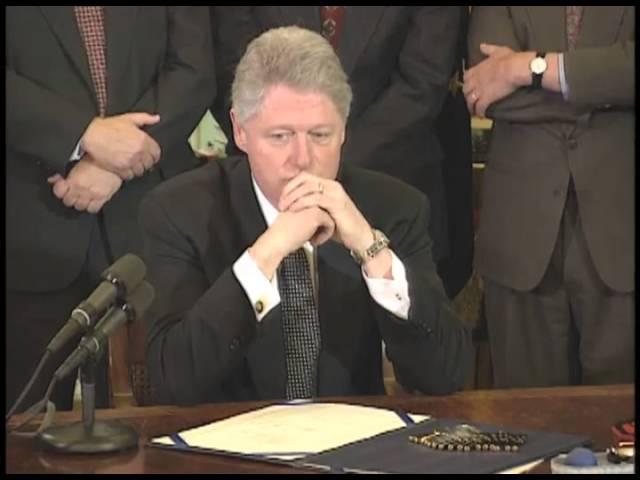 Moment image for Signs Line Item Veto Act