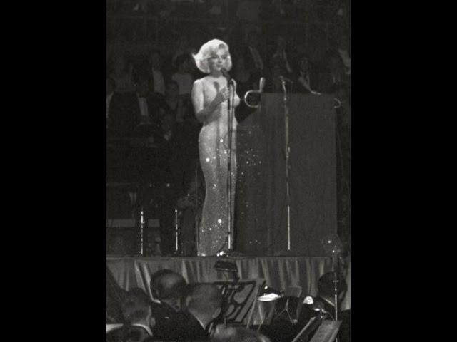 Moment image for Marilyn Monroe's Iconic "Happy Birthday, Mr. President" Performance at Kennedy Fundraiser.