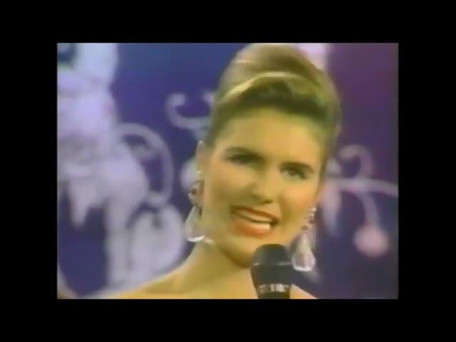 Moment image for Michelle McLean: Namibian Miss Universe 1992 - A Landmark Victory Influencing Global Recognition.