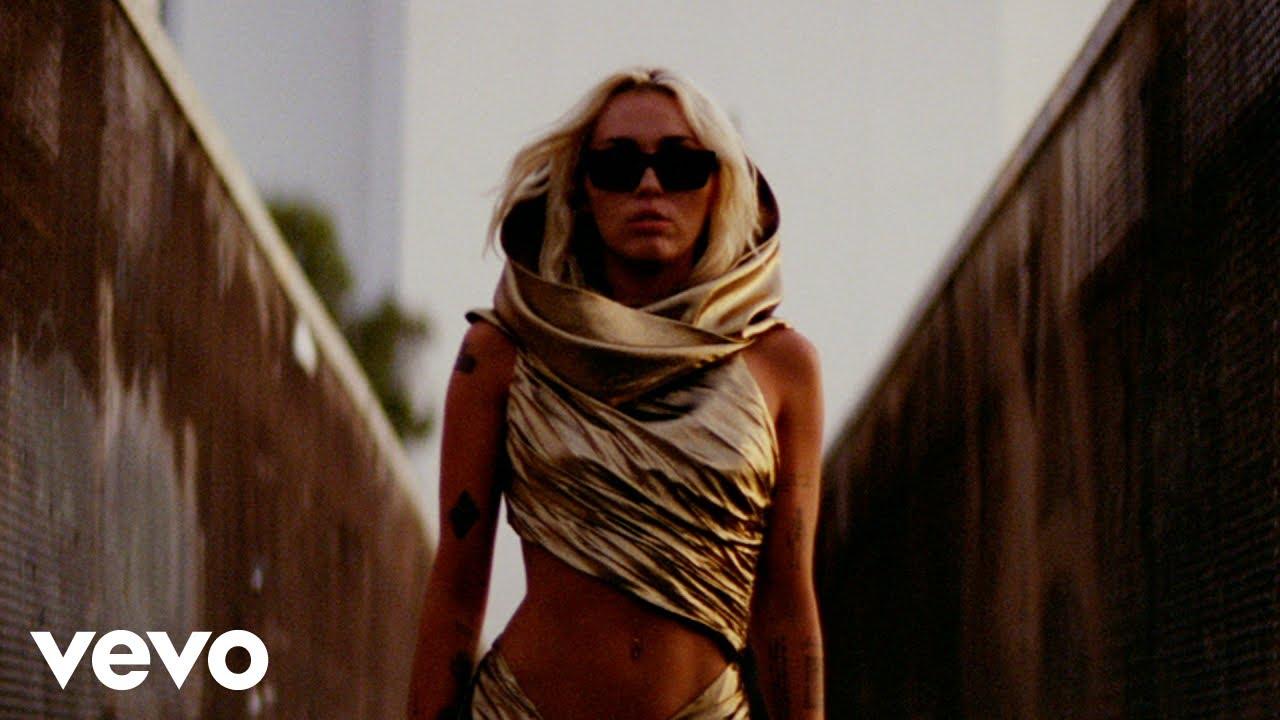 Moment image for Miley Cyrus's Single "Flowers" Tops Charts, Breaks Records, and Empowers Fans