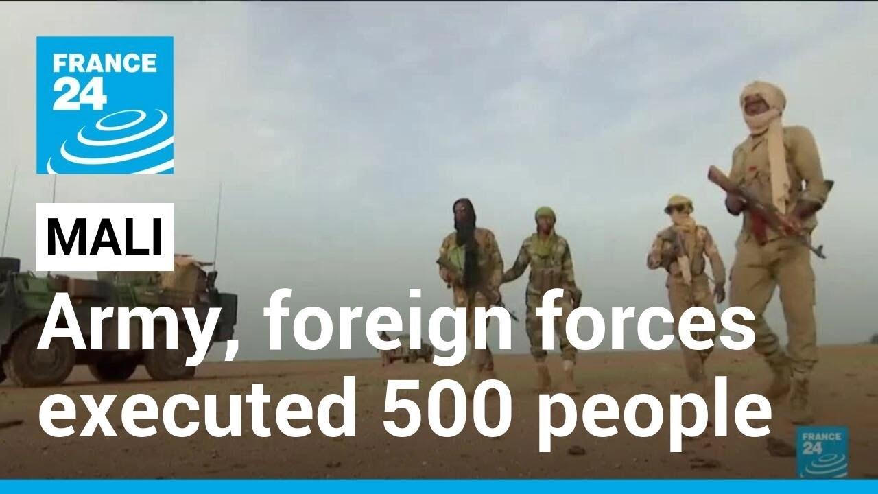 Moment image for Malian troops and Wagner Group execute civilians