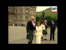 Knighted by Queen Elizabeth II