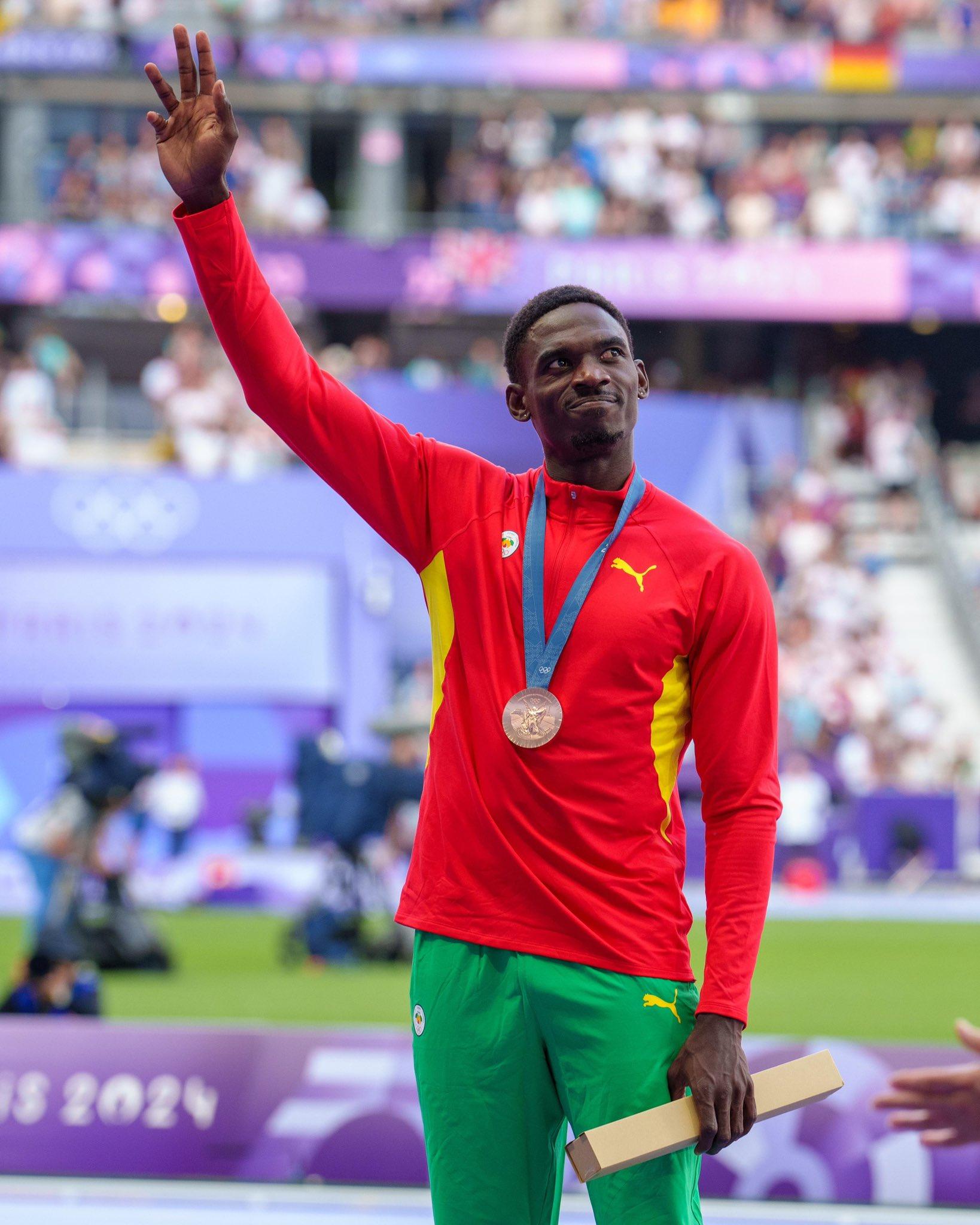 Moment image for Grenada's Lindon Victor wins bronze in men's decathlon at 2024 Olympics in Paris.