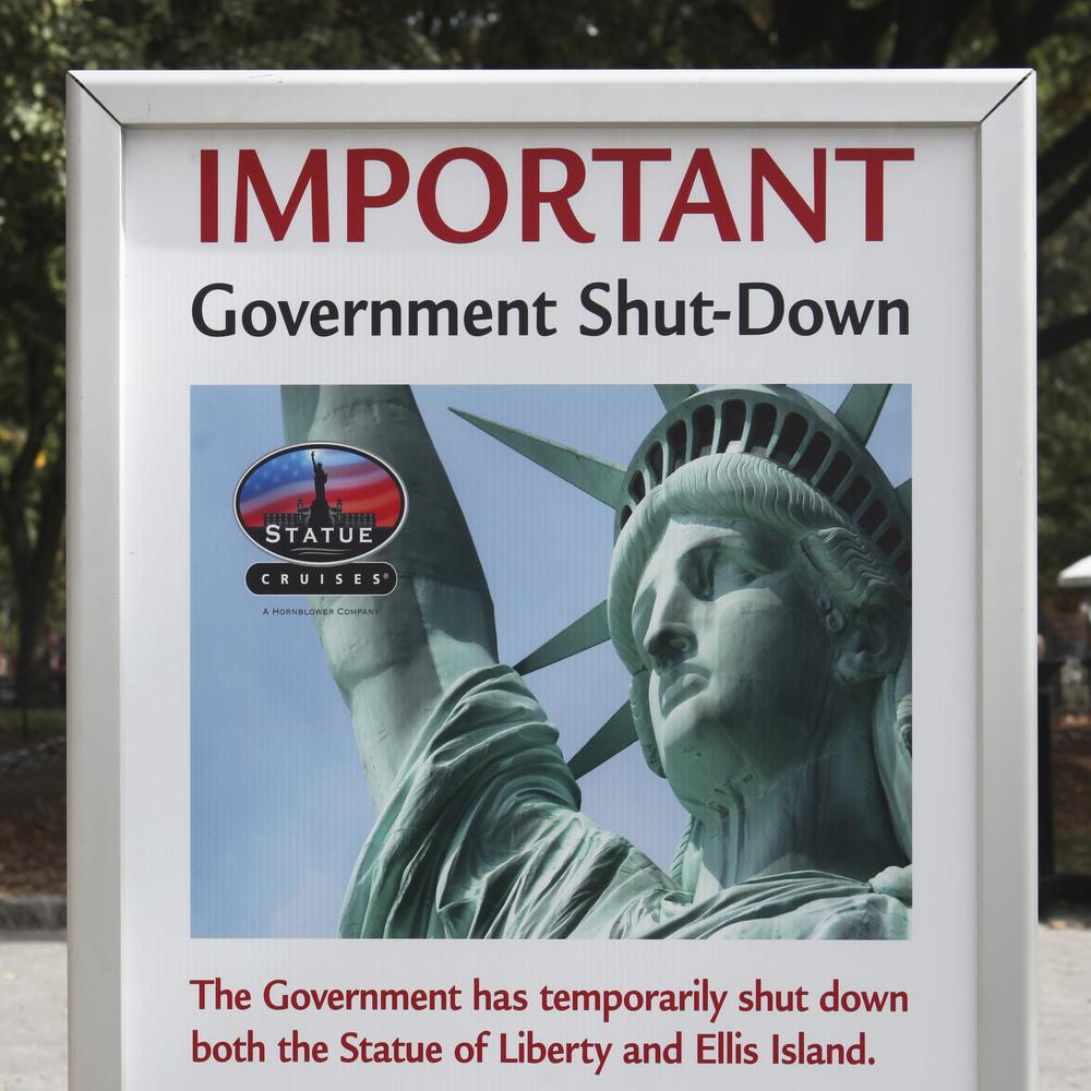 Moment image for Government stops functioning due to disagreement on budget deal between Democrats and Republicans.