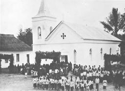 Portuguese missionaries convert indigenous Timorese to Christianity in historical context.
