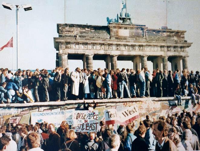 Moment image for Berlin Wall's fall symbolized unity after the divide between East and West.