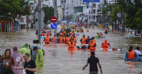 Moment image for Catastrophic flooding and landslides in central and southern Vietnam kill at least 90