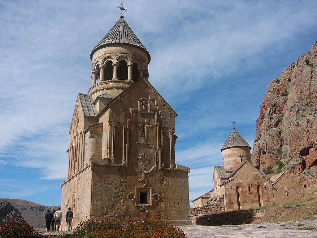 Moment image for Construction of iconic Noravank Monastery showcases stunning medieval Armenian architecture and craftsmanship.