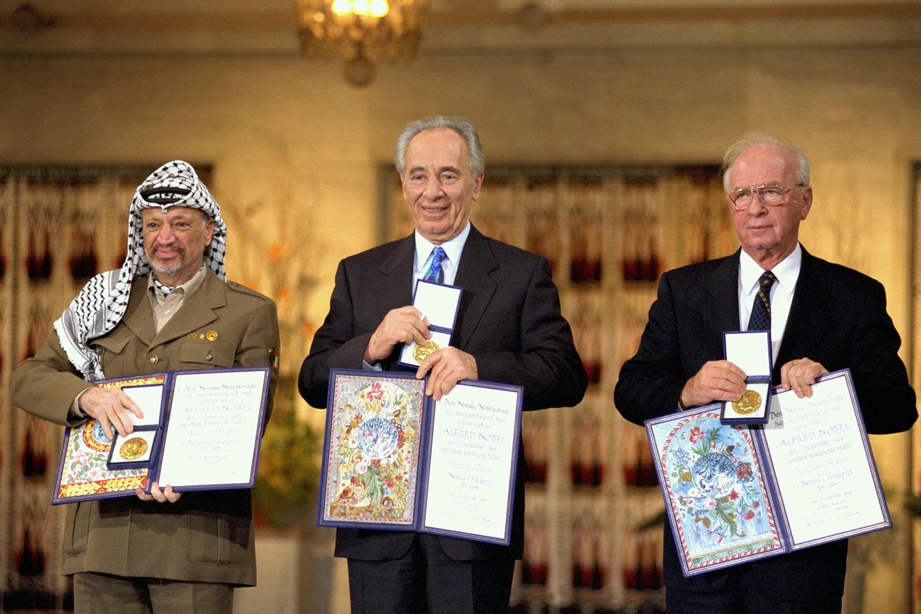Moment image for Nobel Prize honors Arafat, Peres, Rabin for Middle East peace contributions.