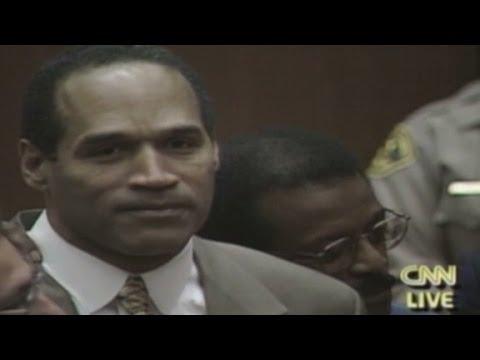 Moment image for O.J. Simpson acquitted of murder charges in highly publicized trial.