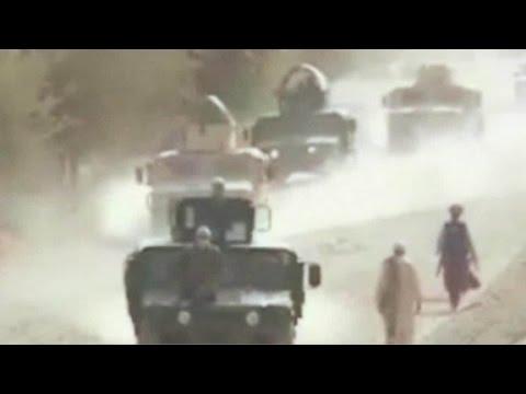 Moment image for Taliban seize control of Kunduz city in military operation.