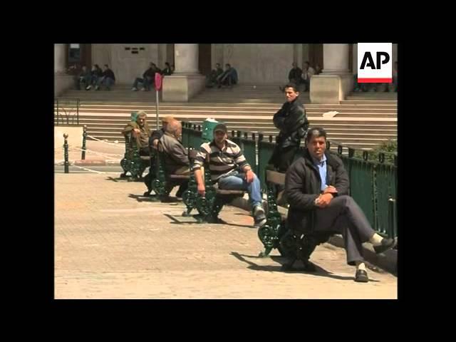 Moment image for President Bouteflika re-elected for third term amidst controversy and criticisms.