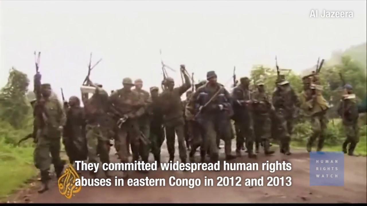 Moment image for Rebels recruited to crush protests in DR Congo