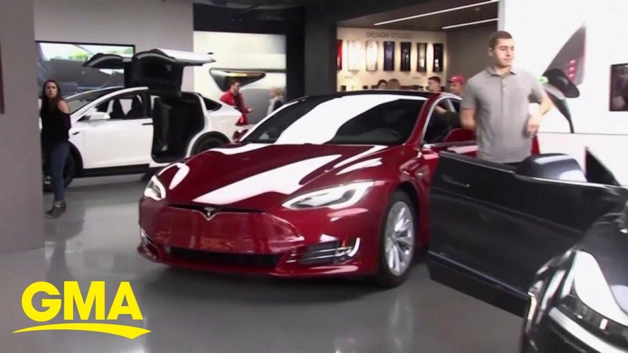 Moment image for Tesla's market capitalization surpasses $1 trillion